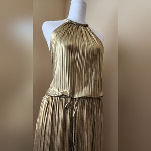 Beautiful 70s gold jumpsuit new! Flattering for the body. Size XL XXL w/ pockets
